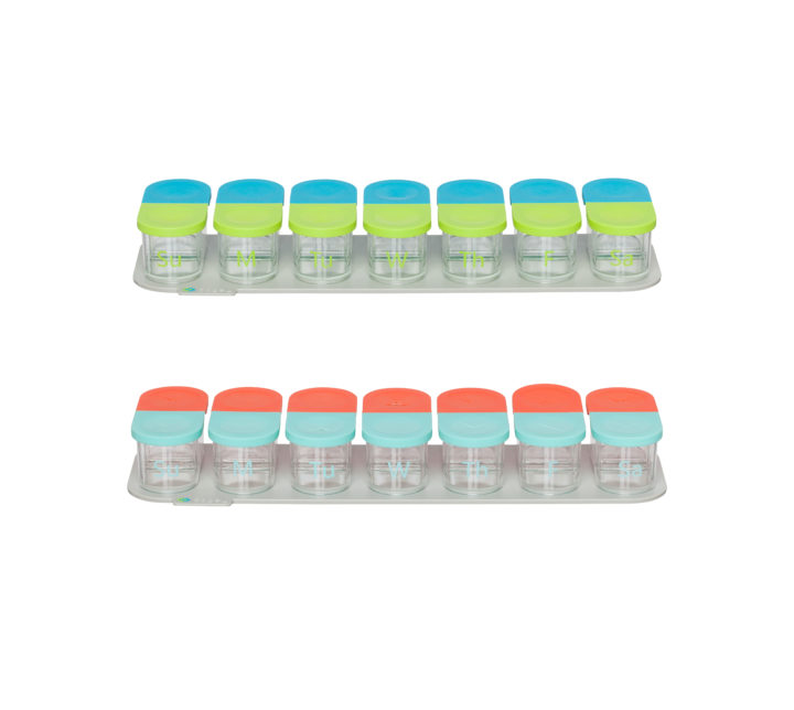 Sagely weekly pill organizer in blue and green and coral and red